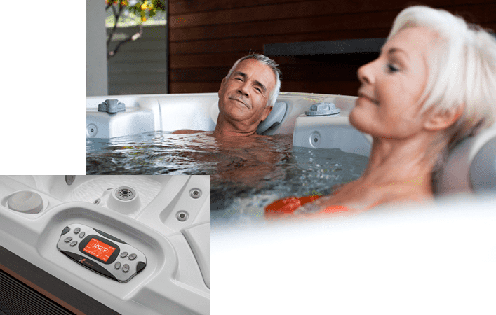 Couple in a Caldera Spa featuring positive Hot Tub Reviews